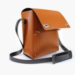 The Pranzo Picnic Bag closes with turn-lock clasps