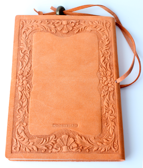 Back side of an orange notebook